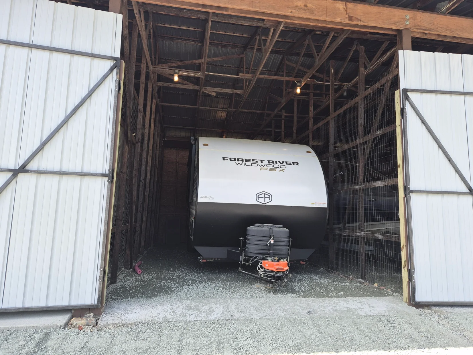 Large recreational vehicle inside indoor RV storage near Apex NC