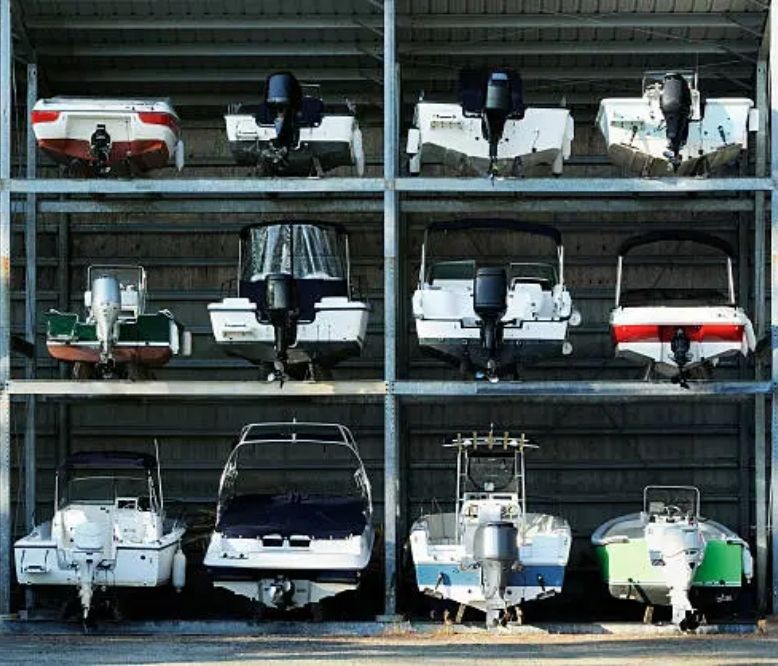 Racks filled with boats at a boat storage near Jordan Lake